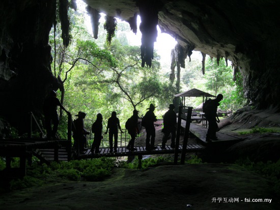 Curtin Sarawak geology students on their way through the Great Cave of Niah to carry out their research and mapping activities