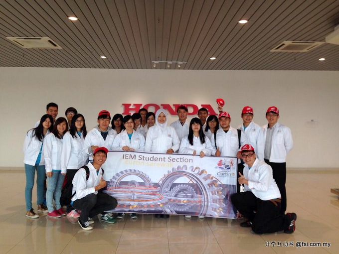 The students pose for a group photo at the Honda plant.