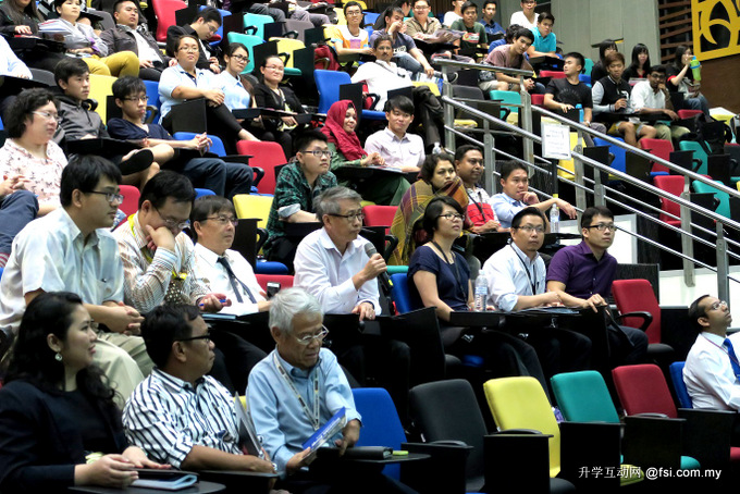 Audience listening attentively during Q&A session.