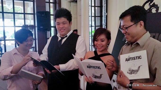 Presenting the book to YB Yap Soo Hui (extreme left), and YB Jeff Ooi (extreme right) is Angelina and her brother Frankie