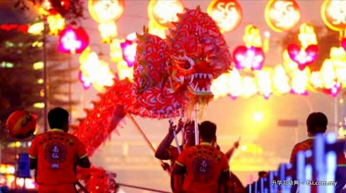 A dragon dance troupe getting ready for their performance at yesterday's opening ceremony.