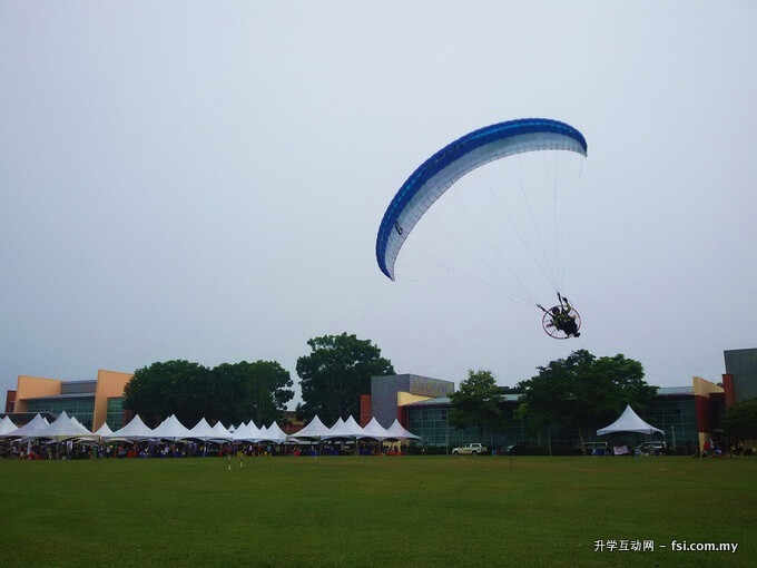 Paragliders drew large crowds of spectators.
