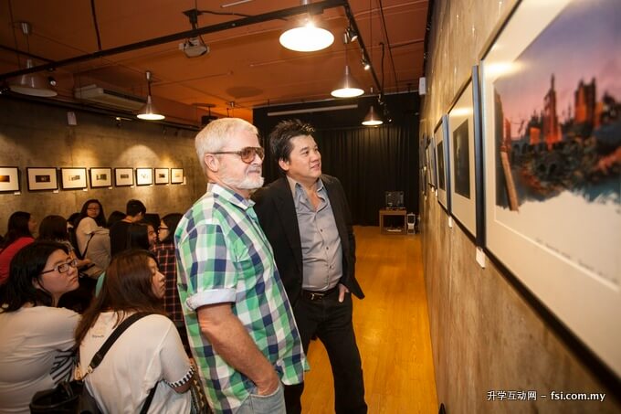 The One Academy Principal & Founder Tatsun Hoi and legendary production designer Hans Bacher looking at some of the original masterpieces at ‘Dream Worlds: The Art of Animation Exhibition by Hans Bacher’ located at The One Gallery.