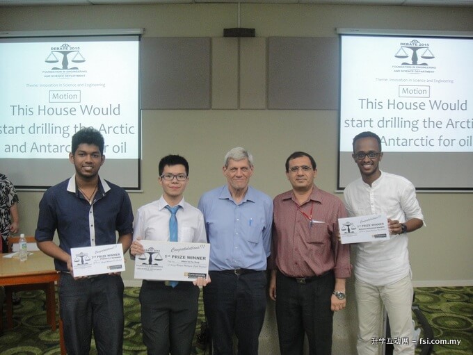 The winners Praween, Tan (left and 2nd left) and Mohamed Mohamoud (right) posing with Professor Cloke (middle) and Foad.
