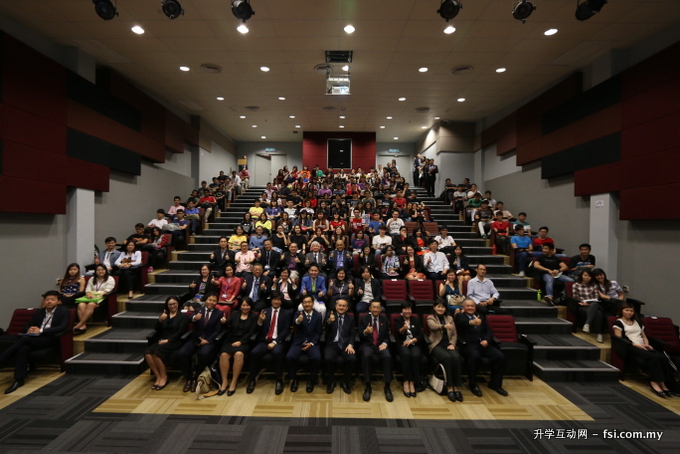 Group photo of attendees including officials from TAR University College and Dankook University.