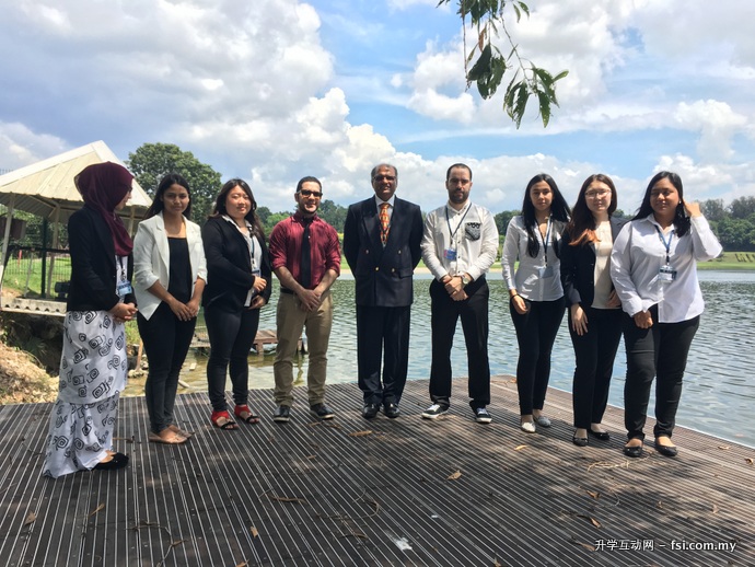 Under the guidance of P. Pathmanaban (center), APU students were the first batch of Malaysian university students to perform industrial training on board the Mariner of the Seas. From left: Ainur Fatihah Zailani (Malaysia), Nur Syazyiana binti Rosli (Malaysia), Sonam Zangmo (Bhutan), Alaa Alnafouri (Syria), P. Pathmanaban, Zaid Ammar Housni (Syria), Zarina Zarifova (Kazakhstan), Surayyo Akhmedova (Uzbekistan), Lay Shar Hiang (Myanmar).
