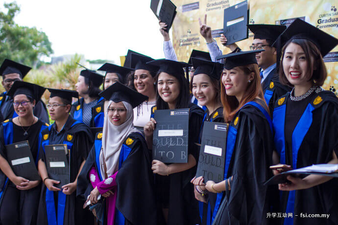 Graduates celebrating their achievement.