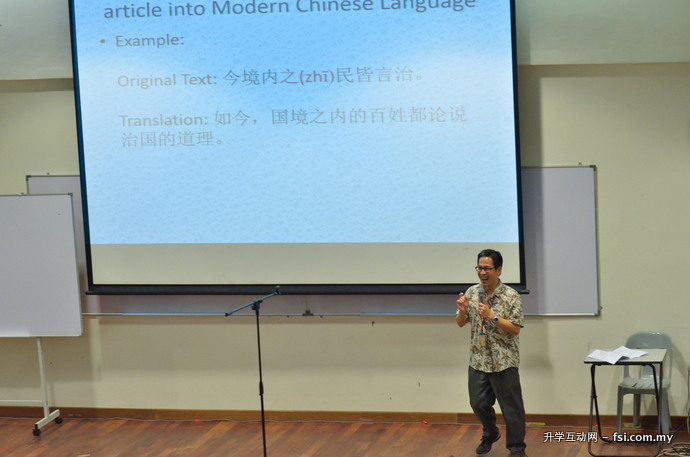 Mok presenting his research paper.