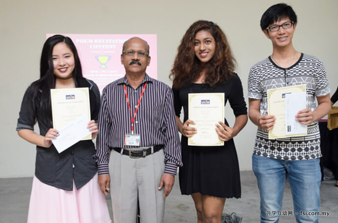 Krishnan with the Poem Recitation Contest winners.