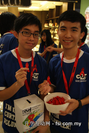 CV! collecting donations and handing out red ribbons.