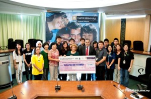 Group photo following the cheque presentation ceremony.
