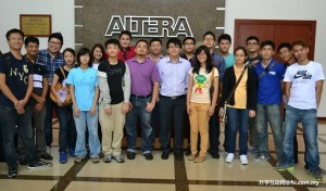 The group posing for a group photo at Altera.