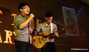 Vocal dynamo James (left) wowing to the accompaniments of a guitarist