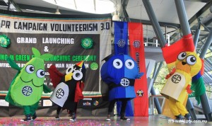 Mascots signifying the four sub-themes, (from left) Environment, Culture and Heritage, Education and Animal Welfare parading on stage