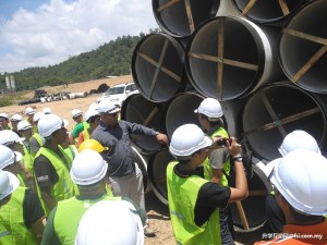Students being briefed on structural features at Keningau Water Treatment Plant.