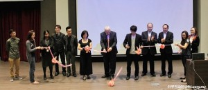 Charmele (3rd left), Associate Professor Ho (6th left), Professor Mienczakowski (7th left) and Jeen Hao (5th right) cutting ribbon during the opening of ‘Breaking the Code of Business and Investment’ conference.